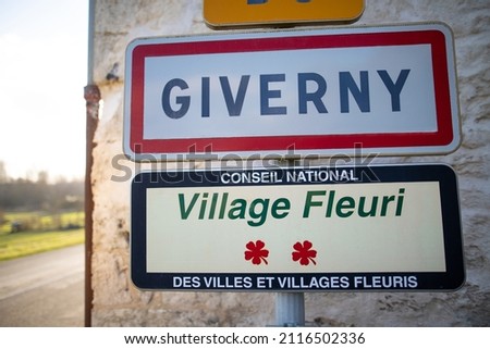 road sign of the French village of Giverny where the impressionist painter Claude Monet lived