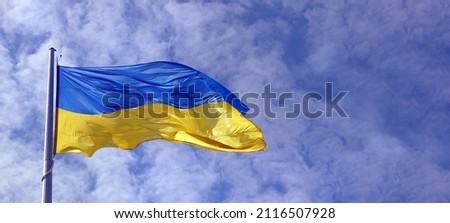 yellow - blue flag of Ukraine against the sky. copy space