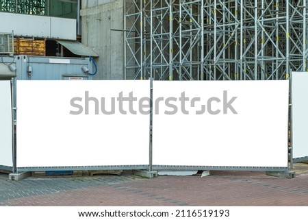 Blank white billboard for advertisement on the construction site