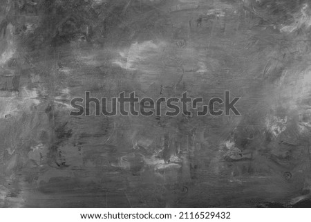 black and gray background with a soft texture. Painted wall.