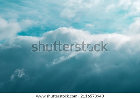 Dark blue storm cloudy sky background 