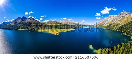 Panorama of a mountain lake. Lake in mountains. Mountain lake panoramic landscape. Mountain lake panorama Royalty-Free Stock Photo #2116587596