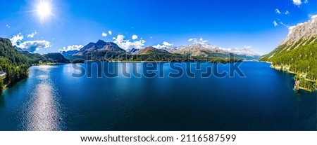 Panorama of a mountain lake. River lake under summer sky landscapes Royalty-Free Stock Photo #2116587599
