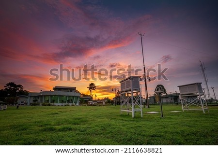 Sunset over meteorology equipment and building in Penang, Malaysia Royalty-Free Stock Photo #2116638821