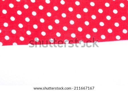 white dots in red textile cloth
