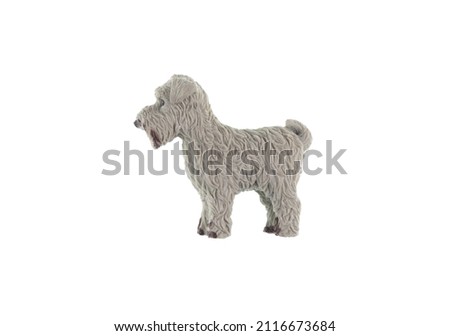 toy plastic dog fox terrier isolated on white background