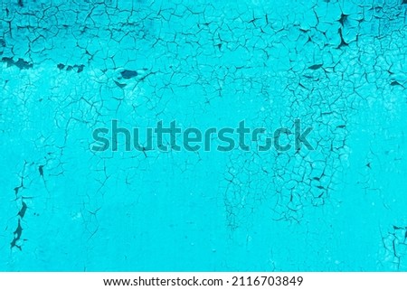 Blue old peeling paint steel cracked texture worn metal background surface weathered iron.