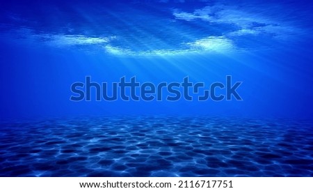 Underwater sun rays in the ocean. Loopable footage Royalty-Free Stock Photo #2116717751
