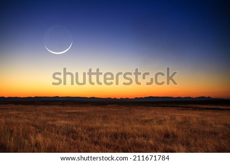 Beautiful new moon at sunset in Madagascar Royalty-Free Stock Photo #211671784