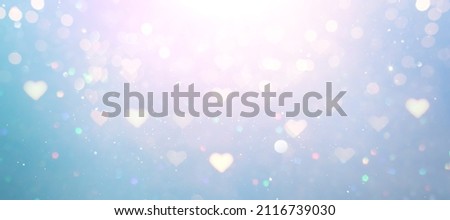 blue and pink glitter vintage lights background. defocused. hearts overlay Royalty-Free Stock Photo #2116739030