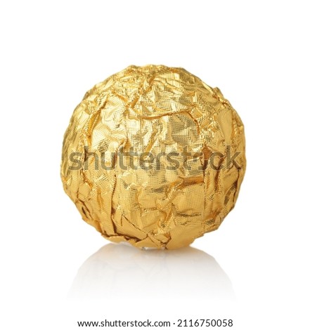 Front view of single chocolate ball candy in gold foil wrapper isolated on white Royalty-Free Stock Photo #2116750058