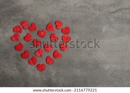 Valentine's Day greetings concept. Little red hearts makes big one. Valentines greeting card.