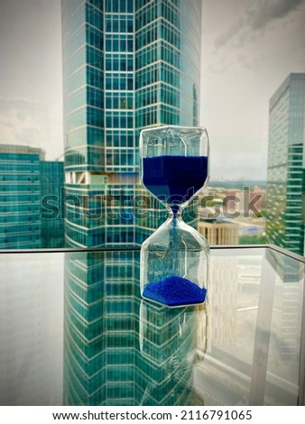 Time concept. Building background. City. Blue. Glass building.