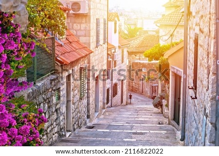 Old stone street of Split historic city sun haze view, Dalmatia, Croatia Royalty-Free Stock Photo #2116822022
