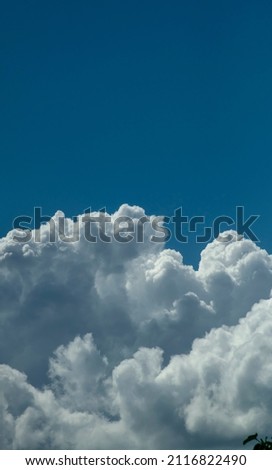 
cumulonimbus clouds during the day
