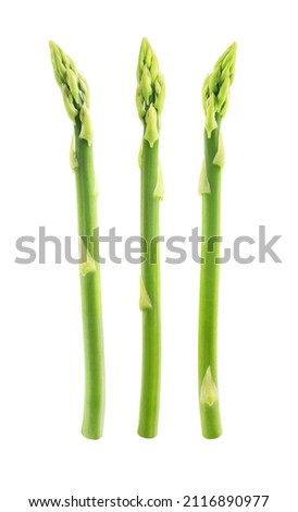 Fresh green asparagus isolated on white background. Clipping path included Royalty-Free Stock Photo #2116890977