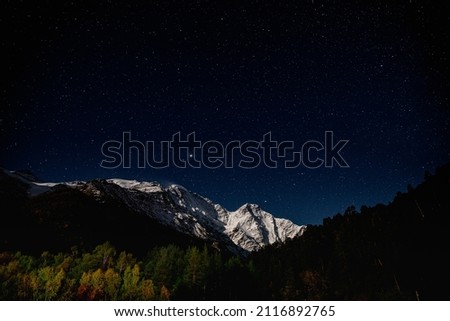 Astrophotography. Night mountain landscape. Milky Way Galaxy