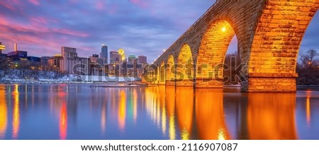 Minneapolis downtown city skyline  cityscape of Minnesota in USA at sunset Royalty-Free Stock Photo #2116907087