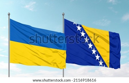 Ukraine Flag and and Bosnia and Herzegovina Flag waving with texture sky clouds and sunset Double Flag - 3D illustration - stock image
