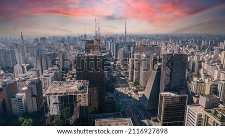 Aerial view of Av. Paulista in São Paulo, SP. Main avenue of the capital. With many radio antennas, commercial and residential buildings. Aerial view of the great city of São Paulo. Sunset sky Royalty-Free Stock Photo #2116927898