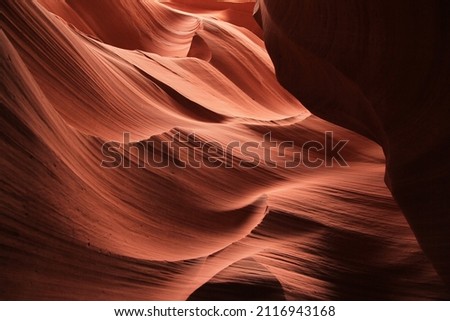 Bumps and dips on the walls of the red rocks of the Antelope Canyon in Arizona