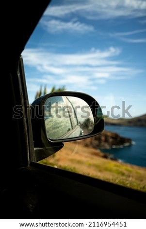 View of car mirror with in the background Ponta de Sao lorence in in Madeira - Portugal