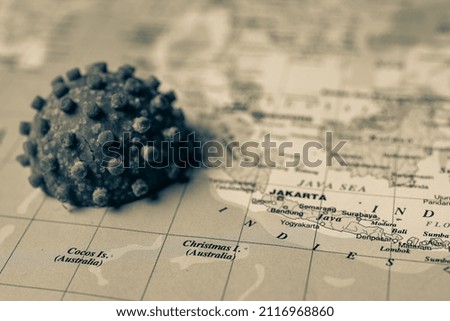 Indonesia with  coronavirus map background