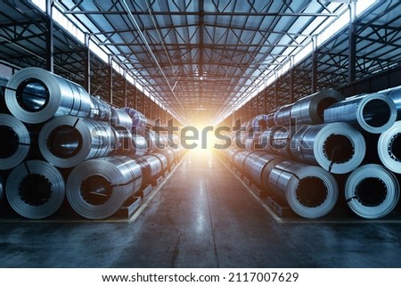 Rolls of galvanized steel sheet inside the factory or warehouse. Royalty-Free Stock Photo #2117007629