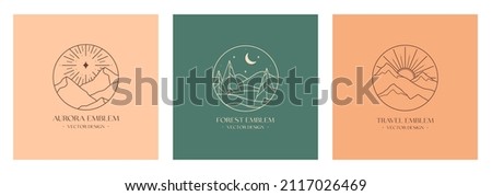 Vector linear boho emblems with snowcapped mountain landscapes,forest.Travel logos with mountains,sun,crescent moon,aurora lights or polar star.Modern hike,camp,nature reserve or wildlife refuge label Royalty-Free Stock Photo #2117026469