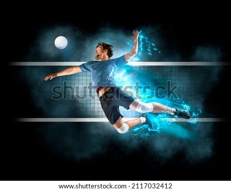 Volleyball player players in action. Sports banner. Attack concept with copy space Royalty-Free Stock Photo #2117032412