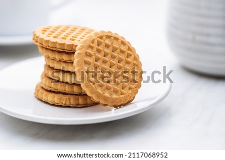 Butter biscuits. Sweet cookies on plate. Royalty-Free Stock Photo #2117068952