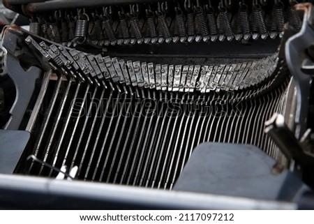 Close-up view of an old typewriter with Arabic and Persian fonts