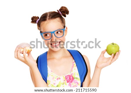 A picture of a schoolgirl doing homework over white background