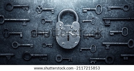  Antique door locks and keys on an old background. Old padlock and key. set as a symbol of security, closeness, history, protection, safety etc. Conceptual background. Blue toning. Royalty-Free Stock Photo #2117215853