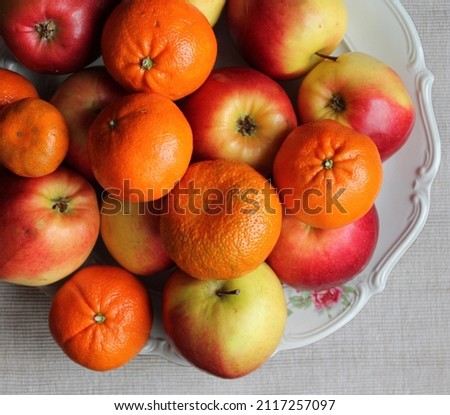 Fresh fruits are lying on the plate