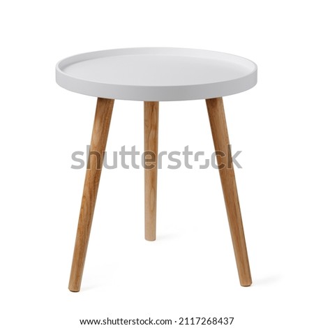 Round coffee table or end table isolated on white background with clipping path. Small round white table with 3 legs on white background. Royalty-Free Stock Photo #2117268437