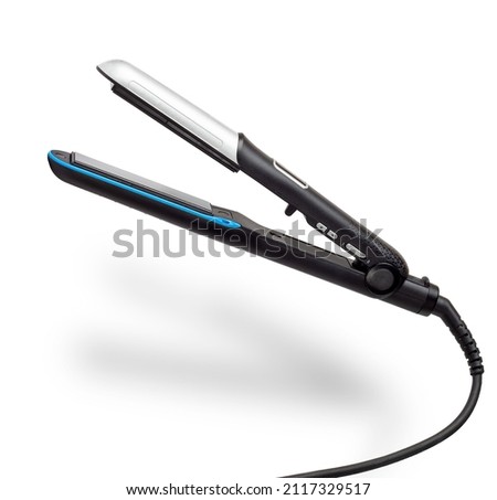 Hair straightener isolated on white background. Hair styling tool. Royalty-Free Stock Photo #2117329517