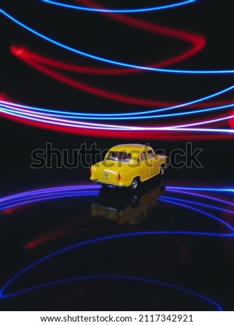 Light painting photography with toy car