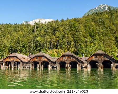 Boathouses in Schoenau am Koenigssee Berchtesgaden Alps Royalty-Free Stock Photo #2117346023