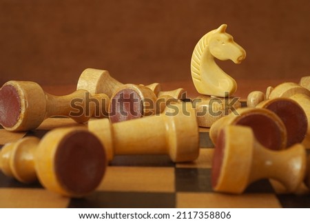 The winning horse concept.  Last one standing in a chess game. Royalty-Free Stock Photo #2117358806