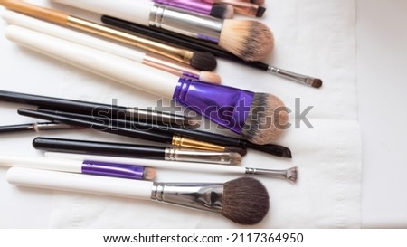 Makeup brushes, after use, on a napkin. High quality photo