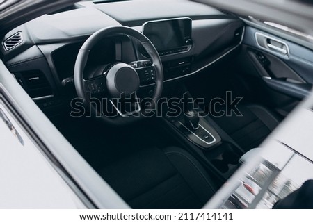 Steering wheel and dashboard inside the car