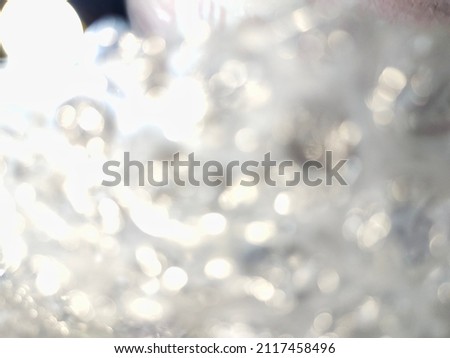 Blurred bubble wrap texture. Abstract background. Flat lay, copy space, top view.