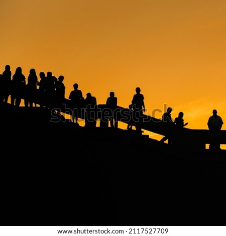 beautiful silhouettes of people at sunset
