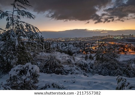 A sunrise over the snow covered Jerusalem, Israel, and the Judea mountains. Royalty-Free Stock Photo #2117557382