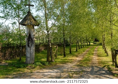 A traditional roadside shrine among the fields, Poland