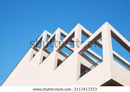 Modern architecture minimal building abstract concrete house. Abstract architecture geometric building modern pillar arch balcony construction. Geometry architecture design building balcony background Royalty-Free Stock Photo #2117617253