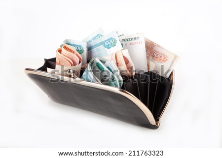 Ruble money in black purse on white background