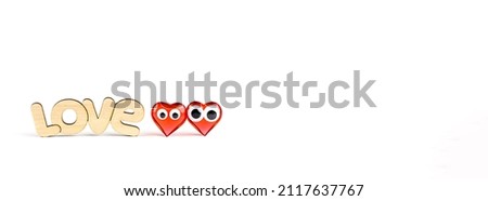 The word Love with Red Hearts on a White Background. Love Concept, Valentine's Day, Congratulations. Banner