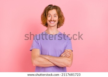 Portrait of attractive cheerful lucky content guy folded arms isolated over pink pastel color background